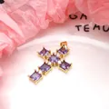 Detailed view of gold-plated cross pendant with square purple zircon stones - Pendant Only / Light Purple