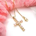 Close-up of gold cross pendant necklace with pink and clear cubic zirconia stones - Pendant Necklace Set / Pink