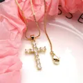 Detailed view of gold-plated cross necklace with sparkling oval cubic zirconia stones - Top And Bottom / Pendant with Necklace / White