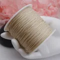 Nahaufnahme der 0,8 mm beigen Baumwollschnur für DIY-Schmuck- und Perlenprojekte - 0.8mm / Beige
