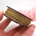 Detailed view of 0.8mm gold-threaded twisted cotton cord for DIY jewelry making - Approx 1.5mm (0.8mm Style) / Khaki