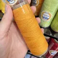 Close-up of bright orange metallic waxed thread spool for DIY jewelry weaving - 0.5mm / Bright Orange (XK06)