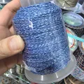Nahaufnahme von 1,2 mm blau-weiß meliertem Baumwollfaden für DIY-Schmuckherstellung - Nr. 4 Ca. 1,2mm / Blau-Weißes Zebramuster