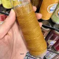 Macro detail view of 0.4mm metallic gold wax thread spool for DIY jewelry crafts. - 0.5mm / Metallic Gold (XK07)