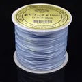 Hilo de cristal elástico plano azul y blanco premium para proyectos de joyería DIY. - 0.6mm / Azul claro