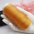 Spule mit 0,5 mm orangefarbenem Flachswachsfaden für DIY-Schmuckwebereien und Bastelprojekte - Süße Orange 75862