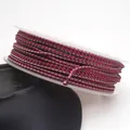 Detailed close-up view of 1.5mm high-density braided dragon pattern cord on a spool - Burgundy-Greyish Purple Dragon Cord (06#) / 1.5mm Diameter 10m/Roll