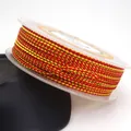 Macro view showing the texture of 1.5mm red and gold braided cord for jewelry making. - 1.5mm / Red and Gold Dragon Cord (08#) / 10 Meters Per Roll / Red and Gold (08#)