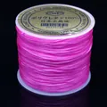 Hilo de cristal elástico plano rosa para hacer joyas de bricolaje. - 0.6mm / Rosa