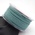 Detail of 1.5mm teal Milan cord with gold flecks on spool for DIY jewelry making - Approx. 1.5MM / Cyan
