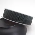 Macro view of 1.5mm dark green and black braided dragon pattern cord on a spool - Standard 1.5mm approx 1.6mm / Dark Green and Black Mixed(7)