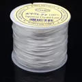 Hilo de cristal elástico japonés plano transparente de alta calidad para joyería DIY - 0.6mm / Blanco