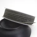 Detailed view of 1.5mm green and black braided dragon pattern cord on a clear spool - Standard 1.5mm approx 1.6mm / Green and Black Mix (14)