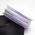 Detail shot showing the texture of 1.2mm colorful braided cotton cord with gold thread - 1.2mm / 06# Pink Blue White Purple