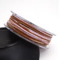 Close-up view of 1.2mm multi-colored cotton cord with metallic glitter flakes - 1.2mm / 07# Brown Light Purple
