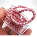 Detaillierte Makroansicht der 5 mm rosa und gold geflochtenen Drachenmusterschnur - 14