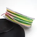 Close-up of 1.2mm rainbow gradient cotton thread with metallic gold glitter for DIY - 1.2mm / 09# Pink White Emerald Green Yellow