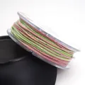 Detailed macro view of 1.2mm multi-colored cotton thread with metallic gold accents for DIY crafts - 1.2mm / 11# Pink Green Yellow Gradient