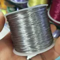 Bobina de hilo de cristal elástico plano gris plata para fabricación de joyas DIY - 0.6mm / Gris