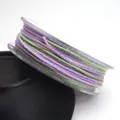 Close-up of 1.2mm variegated glitter cotton cord for DIY jewelry making - 1.2mm / 22# Purple Green Silver Thread