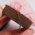 Macro view of 1.5mm brown braided cord with gold metallic threads for DIY jewelry - Approx. 1.5MM / Tan