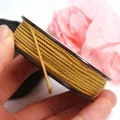 Close-up detail of premium golden metallic Mambo cord for DIY jewelry weaving projects - Approx. 1.5MM / Beige