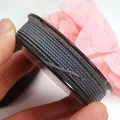 Close-up detail of 1.5mm Mambo cord with gold metallic silk for DIY jewelry braiding - Approx. 1.5MM / Lake Blue