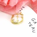 Elegant gold-plated oval photo locket pendant with delicate pink floral enamel design - Pendant Only (No Chain) / White Letter B
