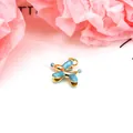 Close-up of a blue enamel balloon dog pendant with gold trim on pink textured background - Lake Blue