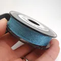 Macro detail of 0.85mm metallic blue iridescent jade thread for DIY jewelry weaving - Approximately 0.8mm / Blue and White (10)