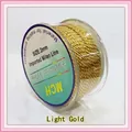 Detailed view of a 2mm metallic light gold Milan wire roll for DIY jewelry and craft - 2mm / Light gold