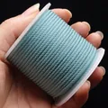 Durable 2mm-3mm turquoise braided nylon cord on spool for DIY jewelry and necklaces - Cyan