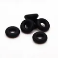 Close-up view of black elastic rubber O-rings used as spacers for DIY jewelry making. - Approx 6mm / Black