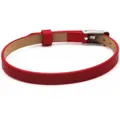 Detailed close-up view of a slim red leather belt bracelet featuring a silver buckle - Screw Rivet Style / 6mm Width / Red