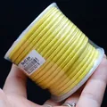 Durable yellow 3mm braided cord on a professional reel for DIY jewelry and necklace making - Approximately 3mm / Gold