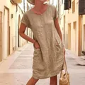 Detail view showing the loose fit and pocket design of a washed cotton linen dress - S / Dresses / Washed Cotton Khaki