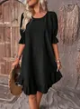 Vintage black cotton-linen dress featuring ruffled cuffs and hem with a loose round neck fit - S / Dresses / Black