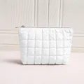 White glossy quilted cosmetic bag showing 22x16x6cm dimensions and 50g weight info - Small Hexagon Bag / White