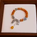 Vintage ethnic style orange agate bead bracelet with silver Buddha and butterfly charms - Butterfly Protection Buddha Peace Style / Orange