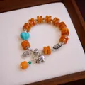 Ethnic style vintage agate and bone bead bracelet with faux turquoise heart charm. - Ingot Pixiu Fortune Elephant / Orange
