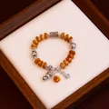 Vintage ethnic style agate beaded bracelet with silver Buddha head and Ruyi charms - Ruyi Buddha Peace Lock Style / Single Strand Beading / Amber