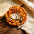 Ethnic vintage multi-layer orange bead bracelet with Dzi bead and silver charms. - Taboo-free Dzi Style / Three Loops Treasure Style / Warm Orange