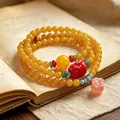 Vintage yellow agate multi-wrap bracelet with colorful charms and pink pendant - Pixiu Treasure Gathering Money Bag Style / 6mm Beads Three Loops / Amber