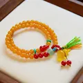 Retro ethnic style yellow amber agate beaded bracelet with gourd pendant and green tassel detail - Gourd Fortune Style / 6mm Beads Two Loops / Amber