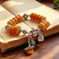 Vintage ethnic style orange agate bead bracelet with Zaki Lhamo and fortune charms - Zaki Lhamo Auspicious Clouds (God of Wealth Style)