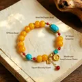 Handmade vintage ethnic style bead bracelet featuring yellow agate and turquoise - Square Tag Fortune God of Wealth (Turquoise Style) / 4mm Red Agate Spacers