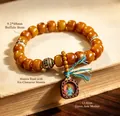 Vintage ethnic ox bone bead bracelet with Green Tara pendant and mantra barrel bead - Leather Pendant Green Tara Style / 9.2x6.8mm Bead Diameter / Amber