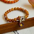 Vintage ethnic style agate and ox bone bead bracelet with Zhaxi Lhamo deity charm pendant - Leather Pendant Yellow Jambhala Style / Amber