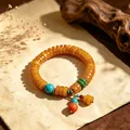 Vintage ethnic style orange bead bracelet with turquoise accents and coral dangles - Zhinuan Style (Imitation Amber Spacers) / Orange