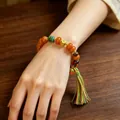 Retro ethnic style agate bead bracelet with colorful tassel and gold charm accessory - Flat Round Persimmon Red Colorful Tassel Bracelet